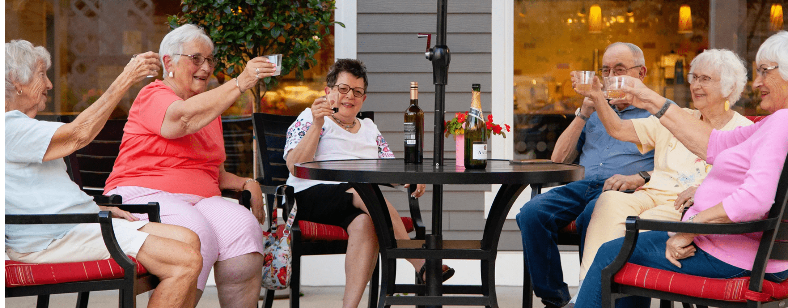 Cottage Grove residence toast outside on a patio