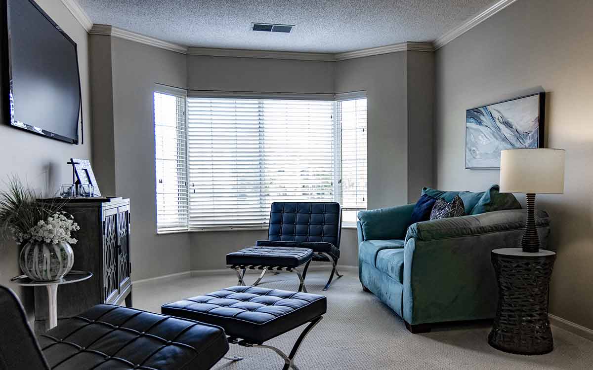 Bright apartment interior at Cottage Grove Place senior living community with modern furnishings