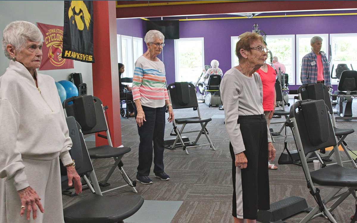 Physical therapy and rehabilitation support provided in the exercise room at Cottage Grove Place