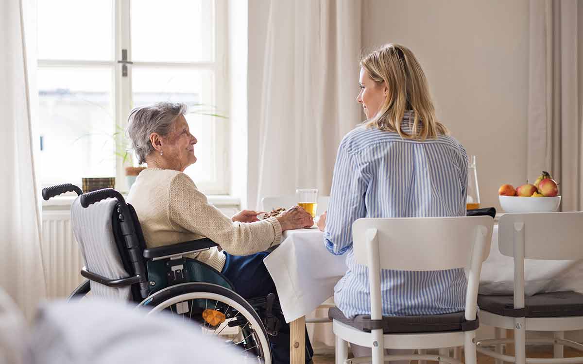 Resident receiving personalized health care support at Cottage Grove Place